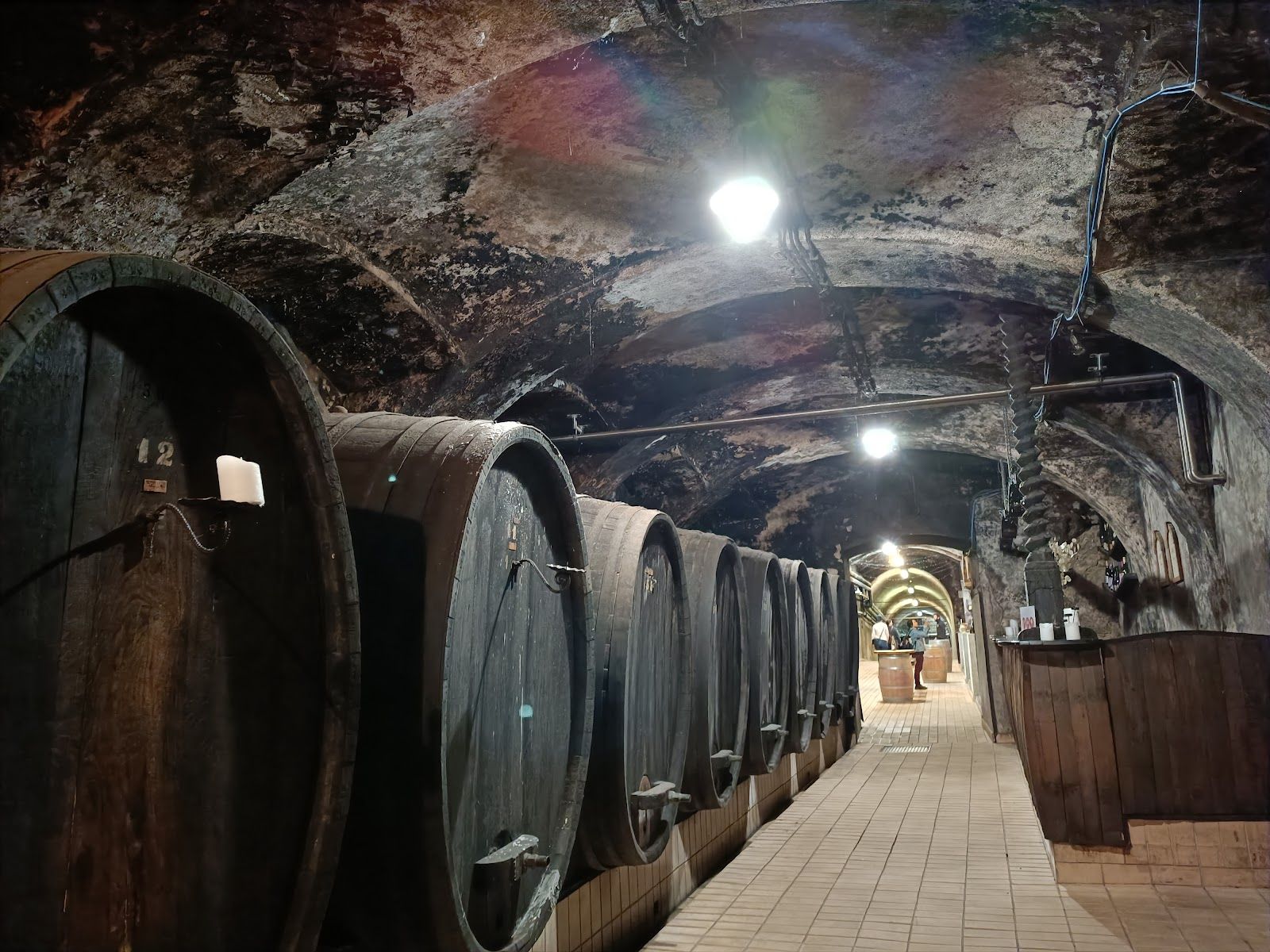This is one of the largest and oldest classical wine cellars in Europe, located right under the city streets! It stretches for over 2 kilometers. Taking a tour through the tunnels feels like you've entered a secret underground city.